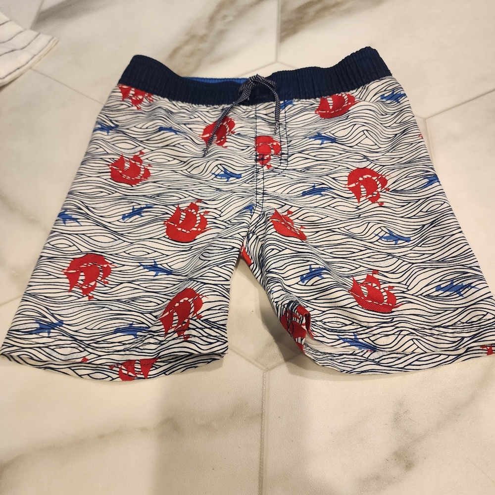 Boys size 5-6,  super cute nautical swim trunks.
